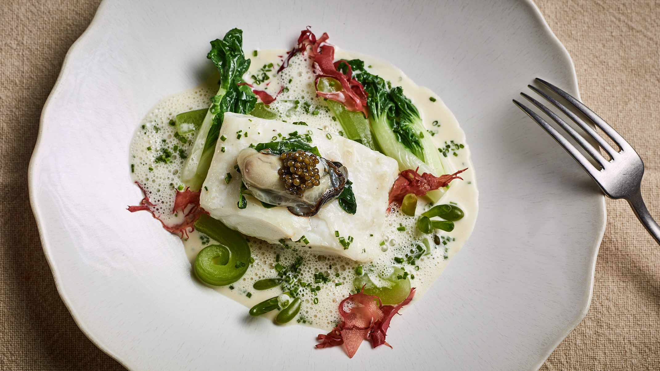 Braised fillet of turbot, oyster and vegetables